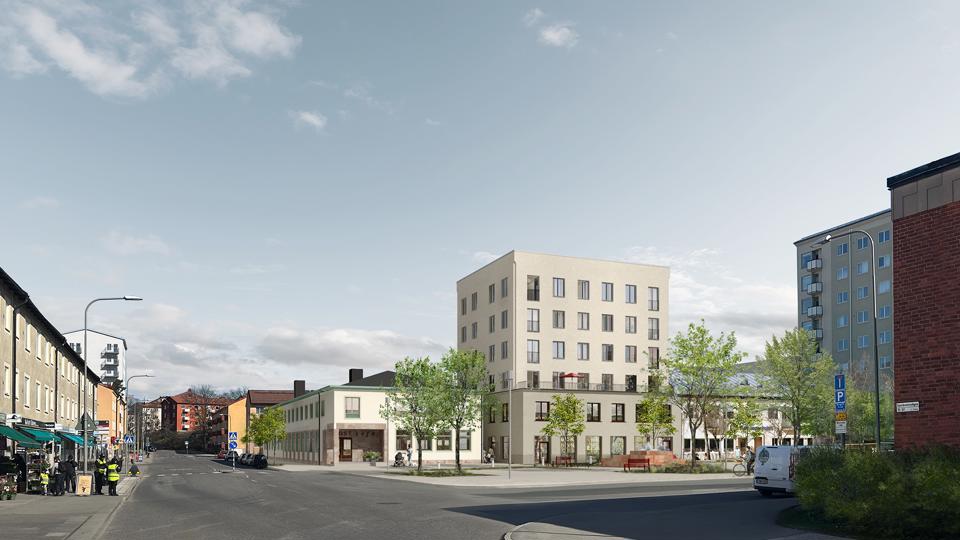 Ett torg med träd och byggnader omkring det. 